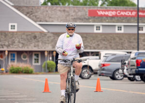 Stephen juggling on bike