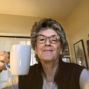 Bela with Coffee Cup